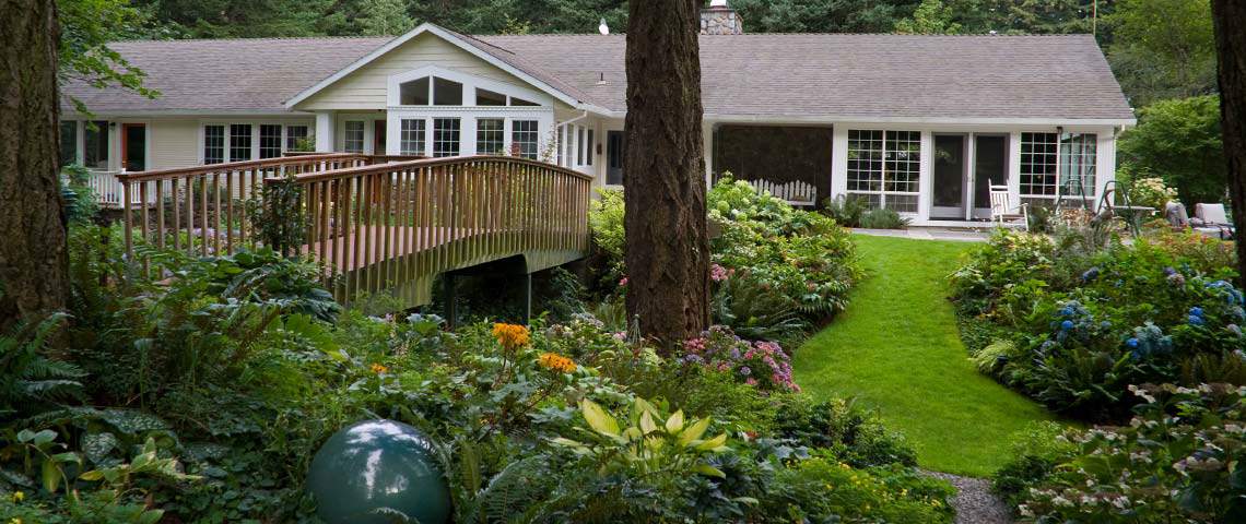 Formal Gardens surround a luxury ranch home